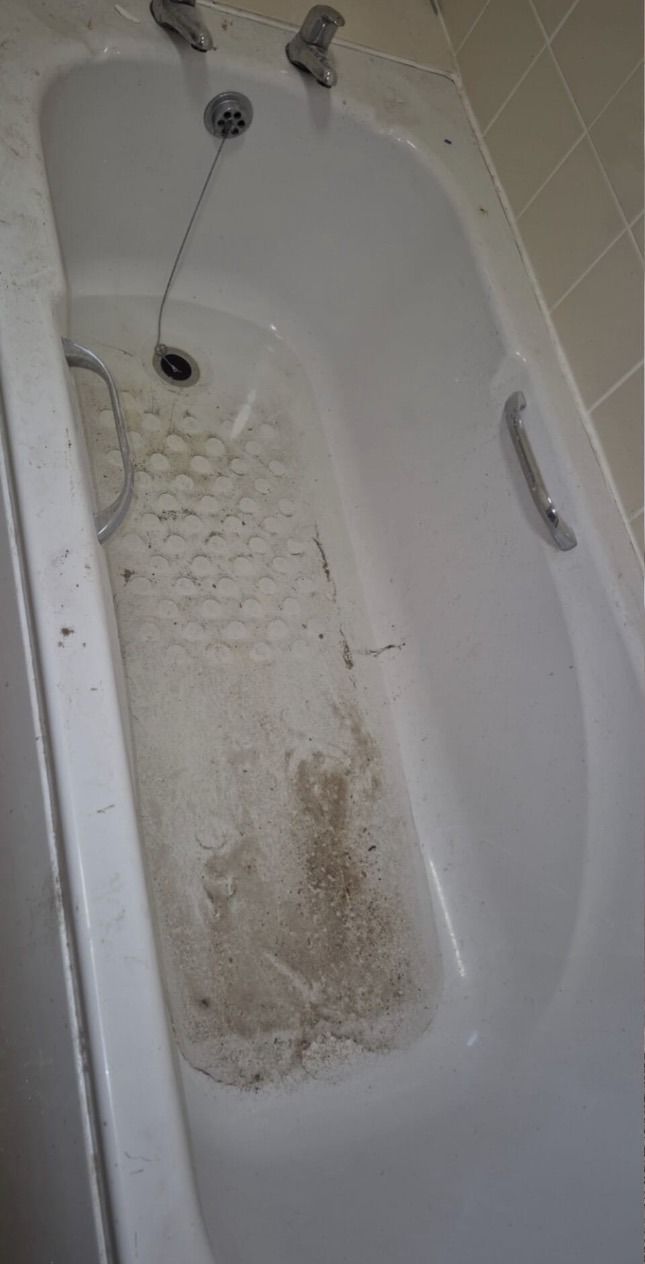 Void property bathroom before Bartley's cleaning